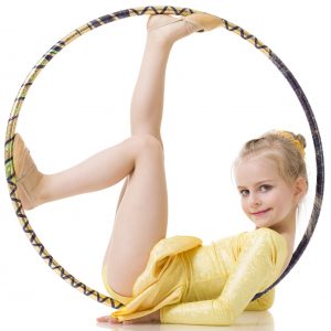Little Gymnast girl with hula hoop isolated on white
